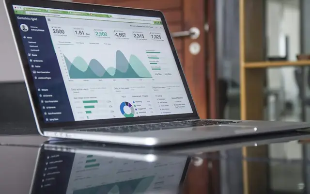 Laptop showing marketing analytics charts